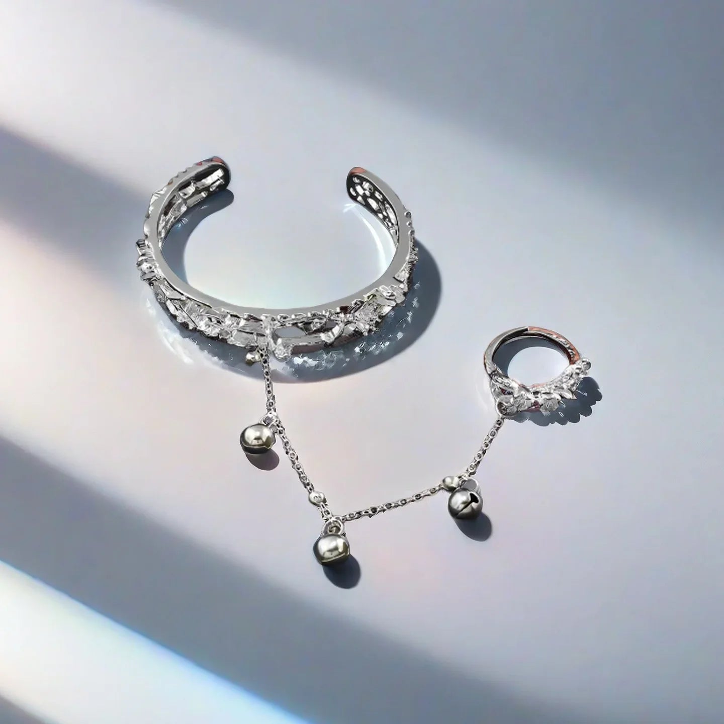 Close-up of TGCF Hua Cheng & Xie Lian cosplay bracelet with crystal accents and bell charms, ideal for cosplay and costume accessory enthusiasts.