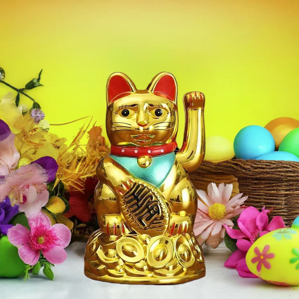 Lucky Waving Cat Maneki Neko gold ornament surrounded by colorful flowers and Easter eggs, perfect for festive Feng Shui home decoration.