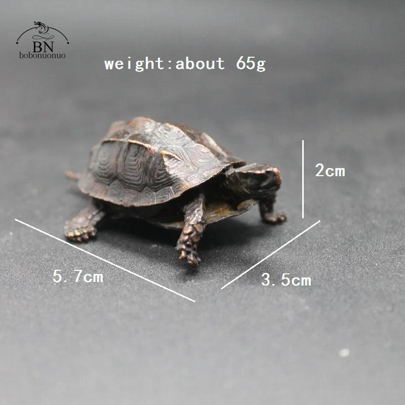 Dimensions and weight of the Vintage Copper Bagua Feng Shui Turtle Statue shown for reference, perfect for home decor and gift purposes.