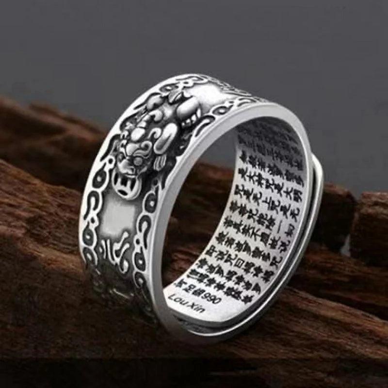 Feng Shui Pixiu Ring Silver Adjustable Wealth Amulet with bold Pixiu figure and spiritual text for men and women.