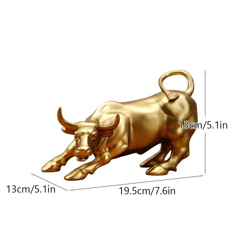 Gold Feng Shui resin bull statue measuring 19.5cm long, ideal for office desktop decor to attract wealth and fortune.
