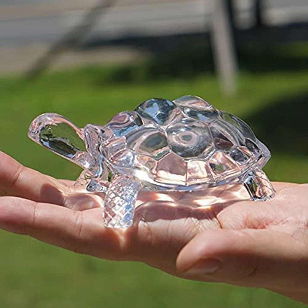Miniature tortoise statue feng shui lucky charm crystal turtle figurine held in hand, ideal for home or office decor.