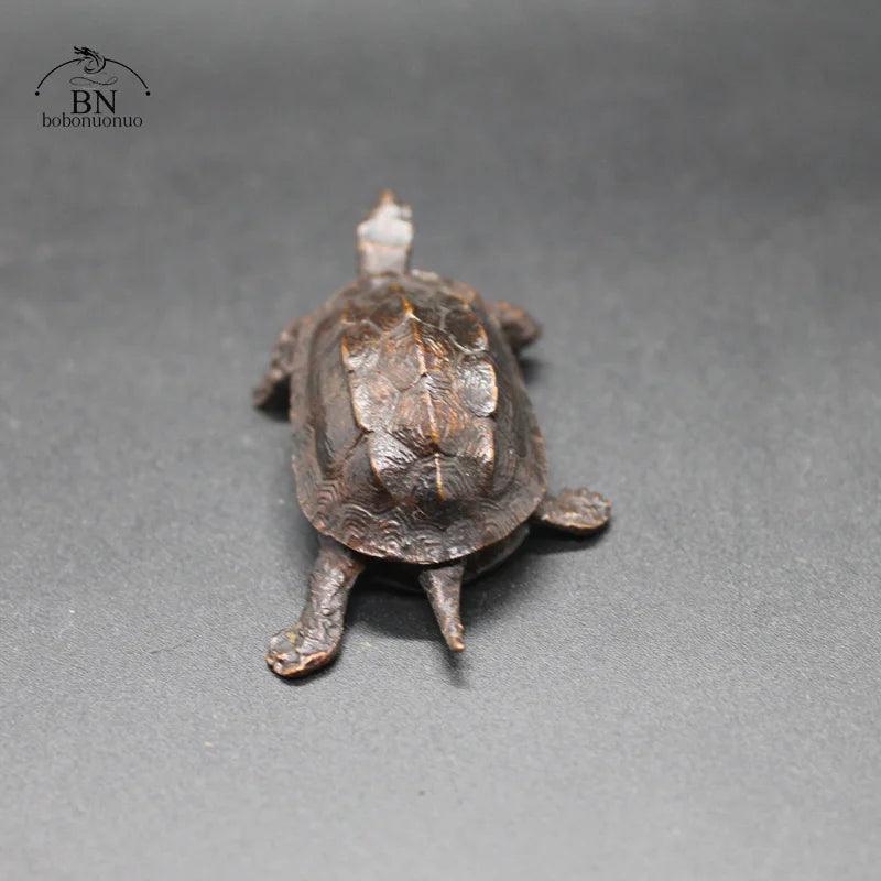 Top-down view of the Vintage Copper Bagua Feng Shui Turtle Statue, showcasing detailed shell design for antique home and garden decor.