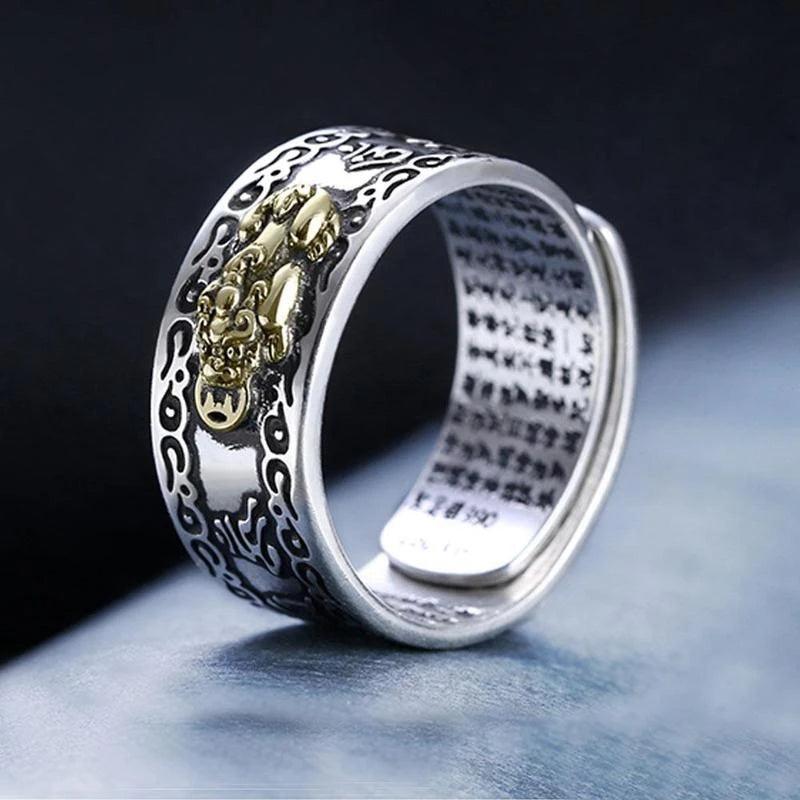 Feng Shui Pixiu Ring Silver Adjustable Wealth Amulet featuring gold Pixiu and engraved script for men and women.