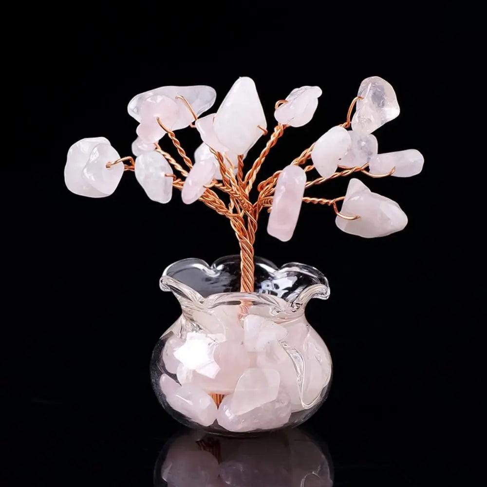 Rose quartz Handmade Feng Shui Crystal Tree Decor for Healing Energy with soft pink stones and copper wire branches in a glass vase.