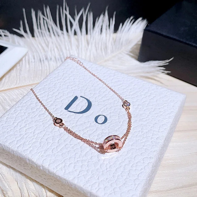 Rose gold Super Sparkling Diamond Bracelet displayed on textured packaging, ideal elegant women's fashion jewelry gift.