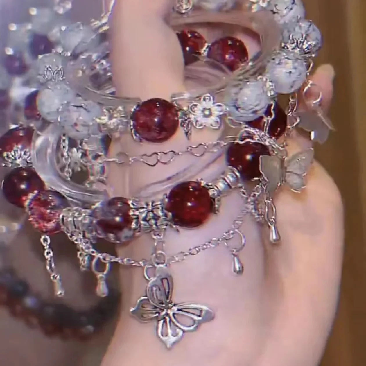 Heaven Official’s Blessing TGCF Cosplay Bracelet Set with layered red, white, and silver beaded accessories styled on hand for anime cosplay.